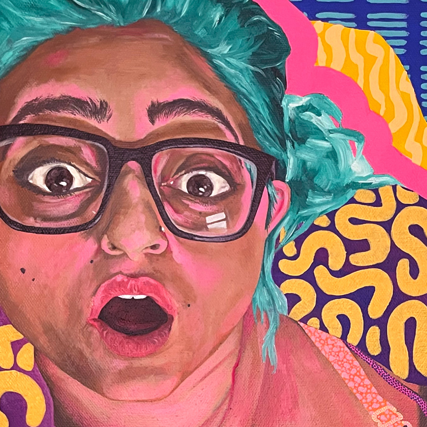 Portrait of a woman, a mother with teal hair and wearing glasses holding a baby against a colorful abstract background with patterns and bright colours